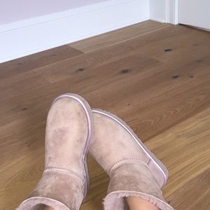 a cute pair of light pink uggs